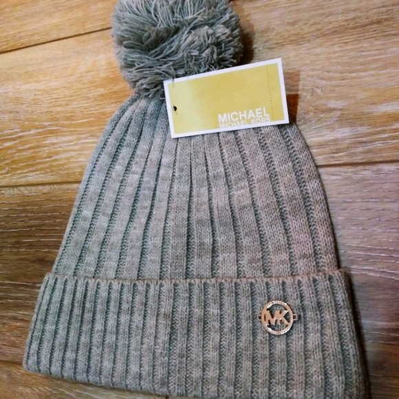 Michael Kors Accessories - Michael Kors light grey pom pom beanie
